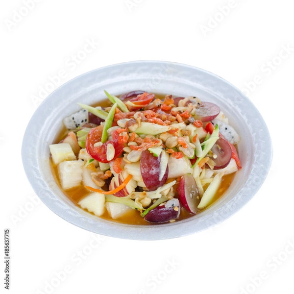 Fototapeta Spicy Thai mixed fruits salad isolated on white background with working path