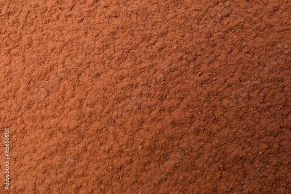 Obraz Pile of cocoa powder as background, top view