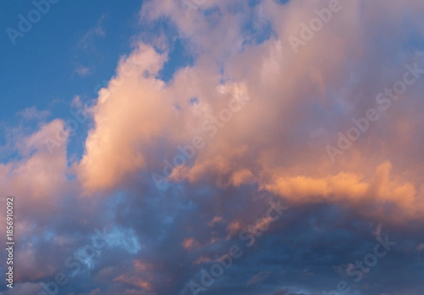 Fototapeta Sunset Clouds Glowing in Warm Evening Light