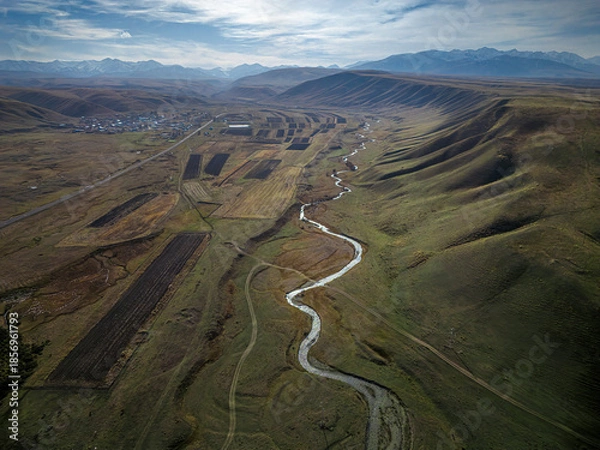 Obraz a mountain gorge with a river and fields