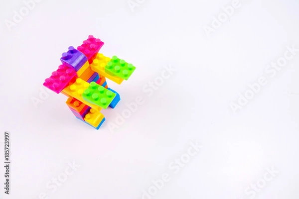 Fototapeta Plastic building blocks isolated on white background