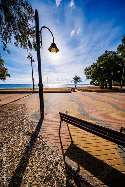 Obraz Sunset Stroll on Patterned Boardwalk