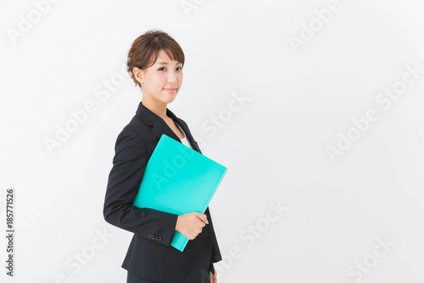 Fototapeta ファイルを持つ女性　ビジネス