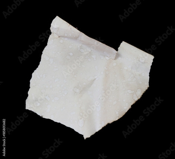 Obraz ripped paper on black background.