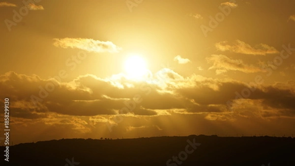 Obraz 夕焼けに輝く空と光の風景