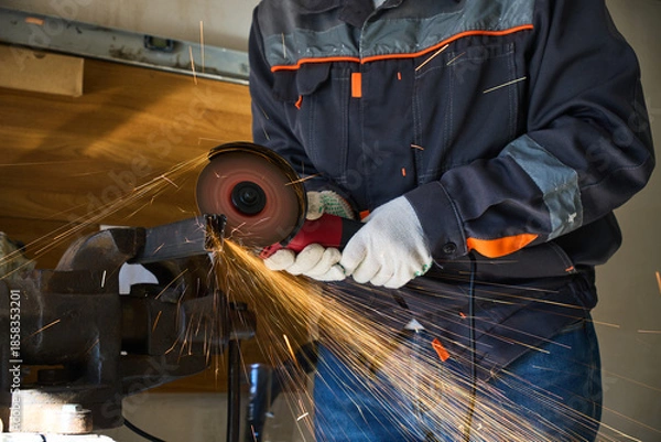 Obraz cutting metal with an angle grinder