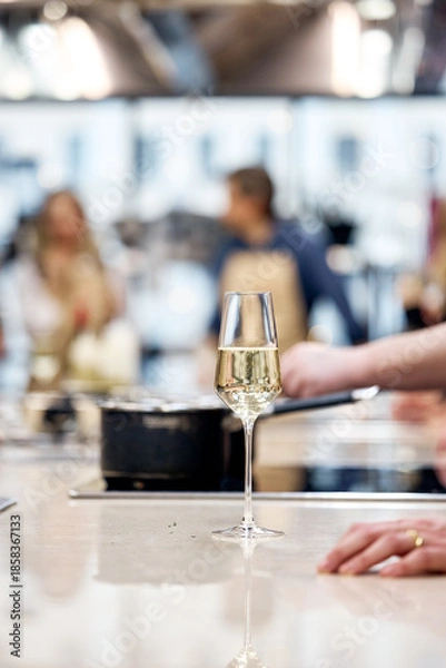 Obraz waiter pouring wine in restaurant