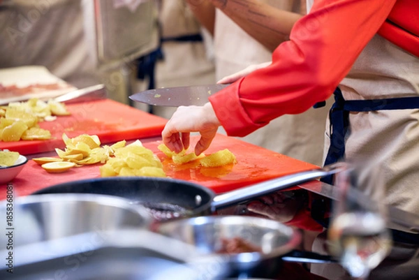 Obraz chef preparing food in restaurant