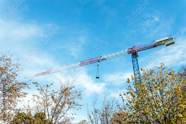 Obraz Crane ad blue sky