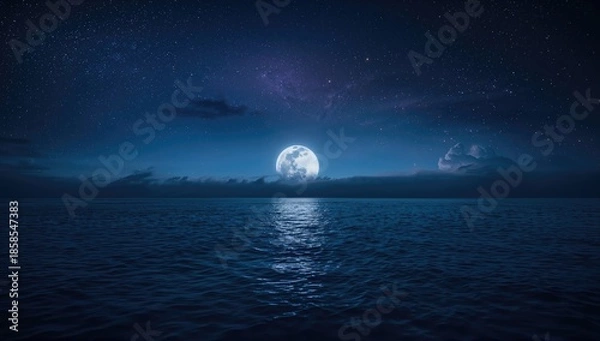 Obraz Full moon casting light over ocean waves at night, suitable for editorial header backgrounds