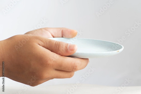 Obraz Offering Gesture with Plain Dish