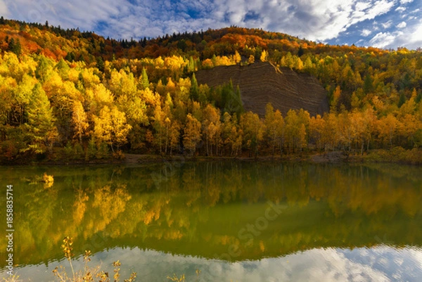 Obraz Autumn landscape in a quarry surrounded by colorful trees, Kozy, Poland, Silesian Voivodeship, natural background or wallpaper