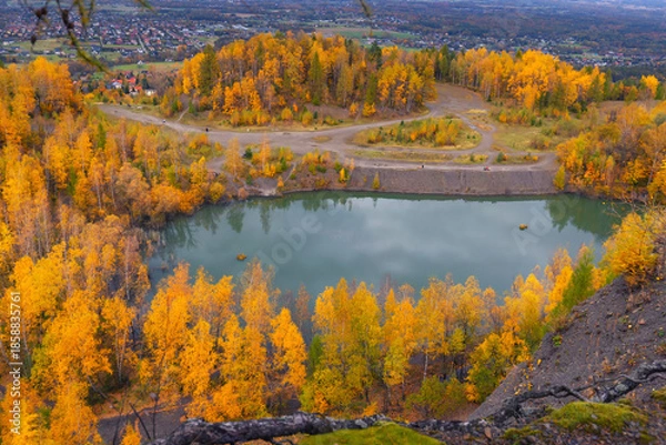 Obraz Autumn landscape in a quarry surrounded by colorful trees, Kozy, Poland, Silesian Voivodeship, natural background or wallpaper