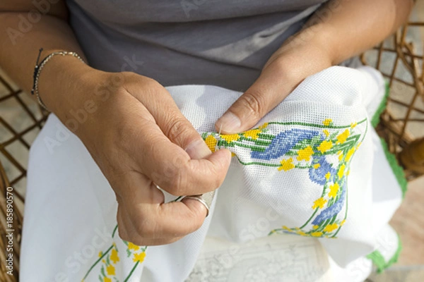 Obraz woman sewing by hand