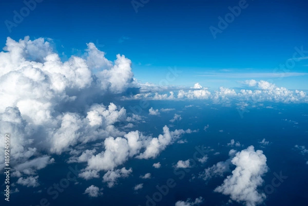 Obraz Aerial view of fluffy clouds over the Pacific Ocean in Polynesia