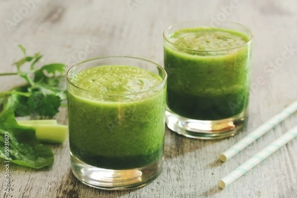 Fototapeta Green Smoothie with spinach celery cilantro, selective focus