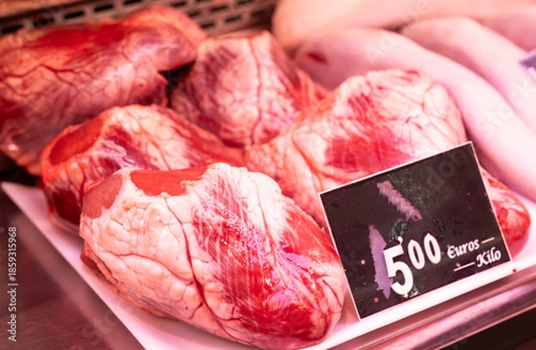 Obraz Raw beef heart on store counter