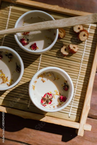 Fototapeta hot tea on a rustic wood background
