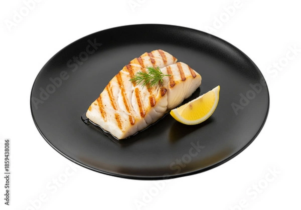 Obraz Grilled Cod Fillet on Black Plate with Lemon Wedge