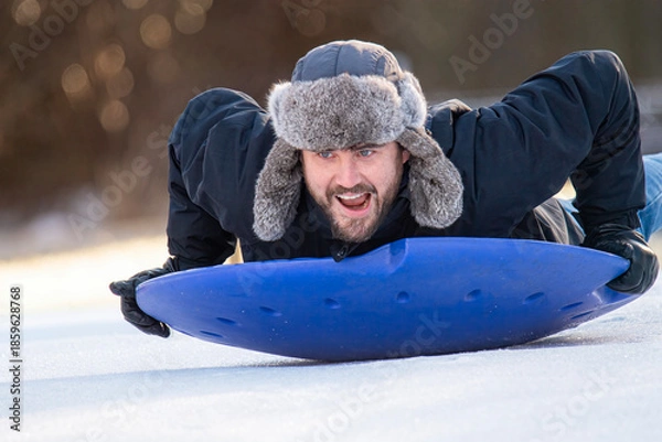 Fototapeta Dad Takes Turn Sledding
