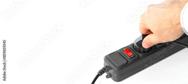 Obraz Hand inserting plug into surge protector, energy saving concept, shutdown, isolated, with space for text.