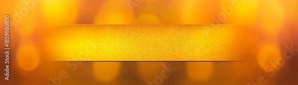 Obraz Vibrant yellow background illuminating with bright downward light beam creating abstract dynamic visual effect.