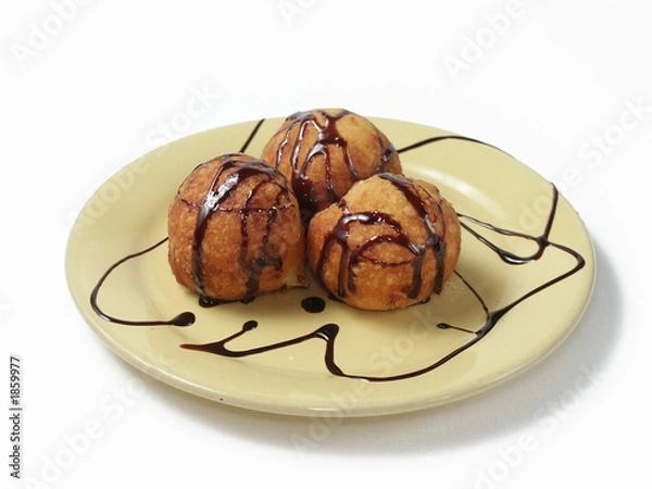 Fototapeta doughnuts with a chocolate syrup