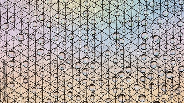 Obraz Rain droplets on a window with geometric pattern background