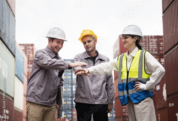 Fototapeta Workers Join Hand for Collaboration in the container yard