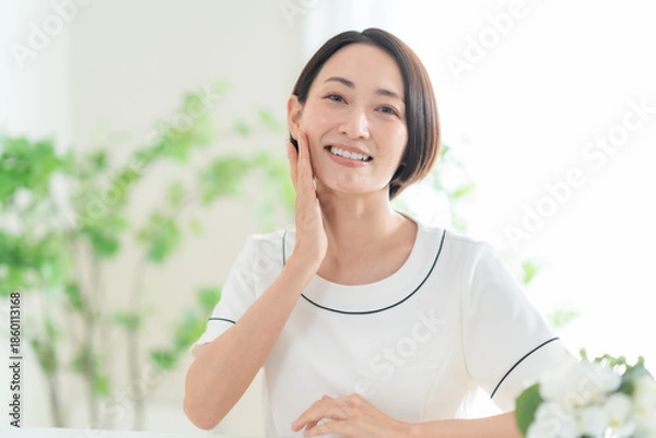 Obraz カウンセリングをする女性エステティシャン