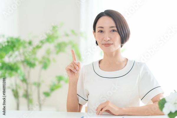 Obraz カウンセリングをする女性エステティシャン