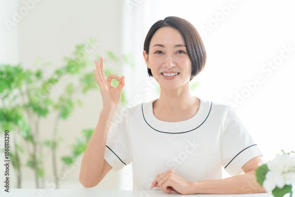 Obraz カウンセリングをする女性エステティシャン