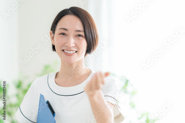 Obraz カウンセリングをする女性エステティシャン