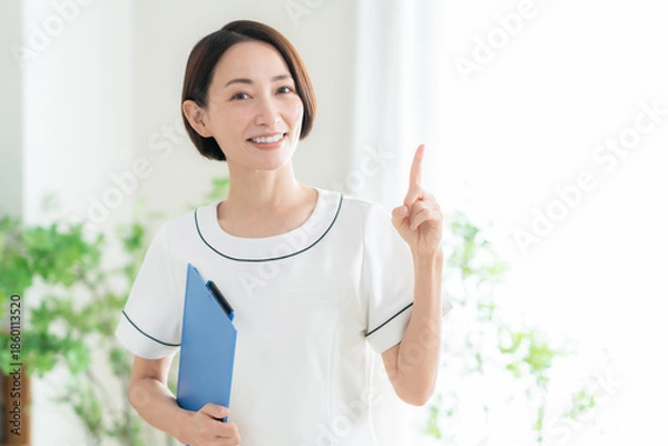 Obraz カウンセリングをする女性エステティシャン