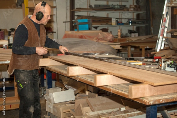 Fototapeta Carpenter at workshop