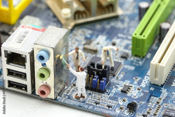 Fototapeta Miniature people : engineer and worker working on computer mainboard bitcoin concept.