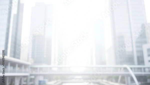 Fototapeta 白色基調の背景画像　強いソフトフォーカスのイメージ画像　ぼやけた都会のビル街の風景　ビジネス用背景素材　強い背景ボケ