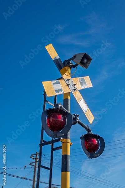 Obraz 青空に映える踏切警報機