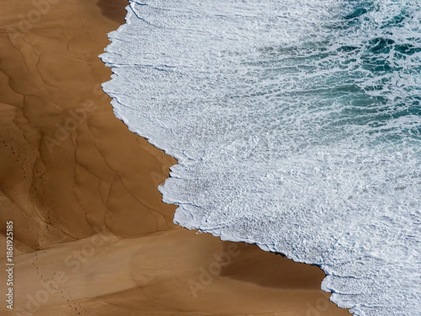 Obraz Ocean waves crashing on a sandy beach