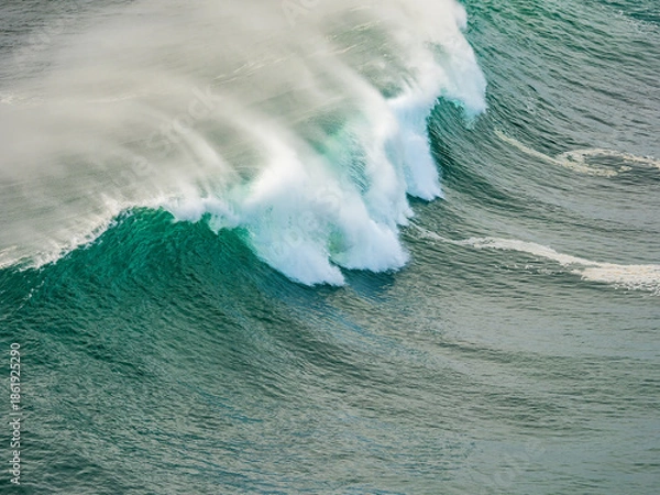 Obraz Ocean wave breaking with powerful water spray and foam