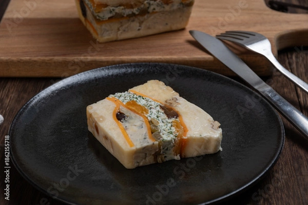 Obraz ドライフルーツとナッツを贅沢に練り込んだ濃厚チーズテリーヌ