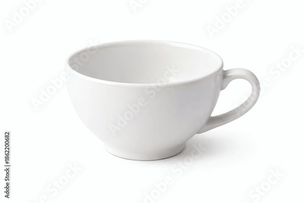 Obraz White ceramic teacup with handle on a white background image