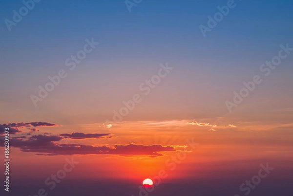 Obraz Sunset with sun and clouds nature