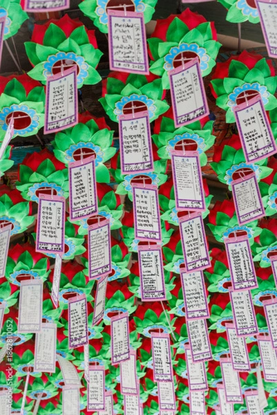 Fototapeta Notes hanging from temple roof