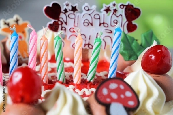 Obraz candles lighting on birthday cake