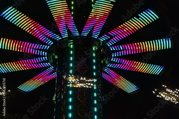 Obraz Spinning carousel lights at night