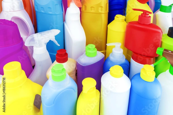 Obraz background of multi-colored bottles with household chemicals