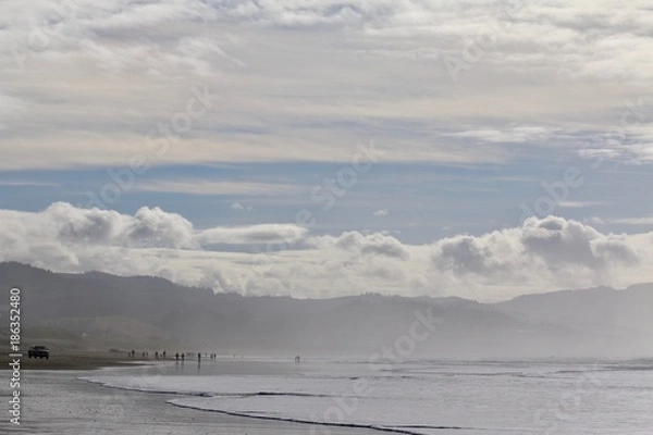 Fototapeta Playing at Cape Kiwanda