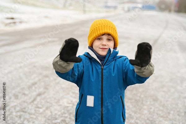 Obraz kid boy in warm jacket