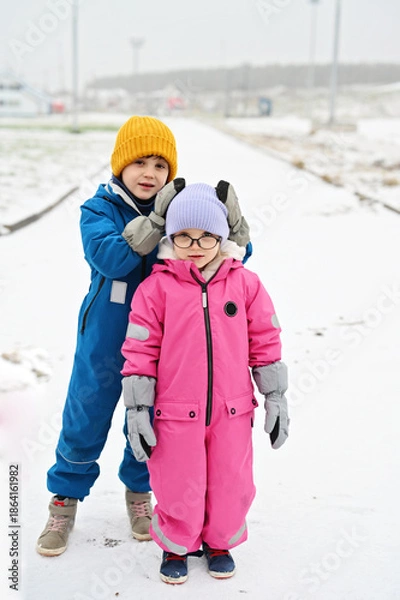 Obraz three siblings on winter day